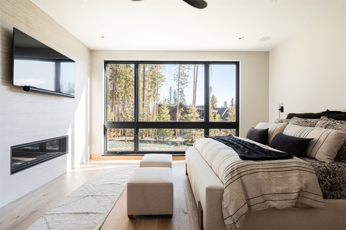 119 Boulder Circle Breckenridge, CO 80424 - Photo 19 of 50 a bedroom with a bed and a large window