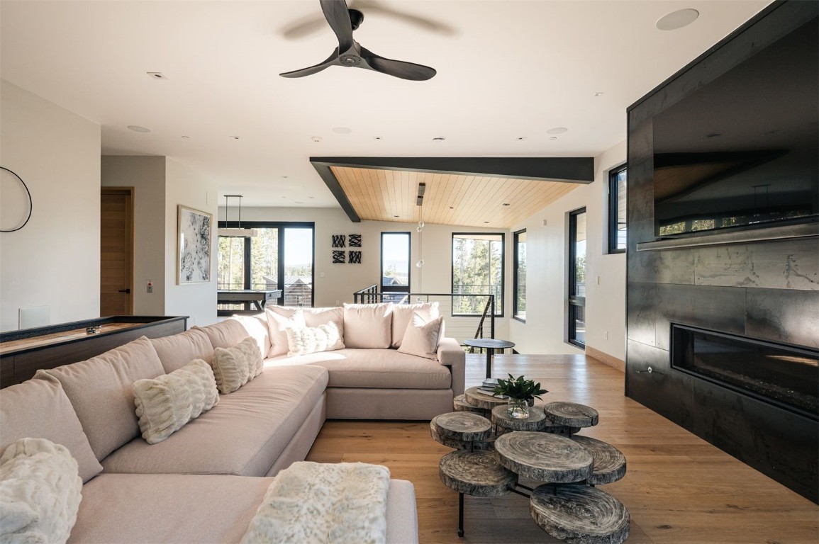 119 Boulder Circle Breckenridge, CO 80424 - Photo 26 of 50 a living room with furniture and a flat screen tv