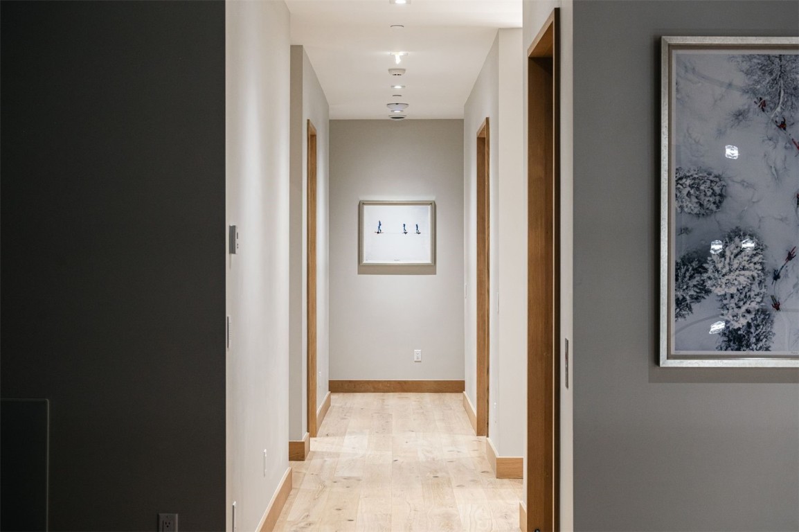119 Boulder Circle Breckenridge, CO 80424 - Photo 28 of 50 a view of a hallway with wooden shelves