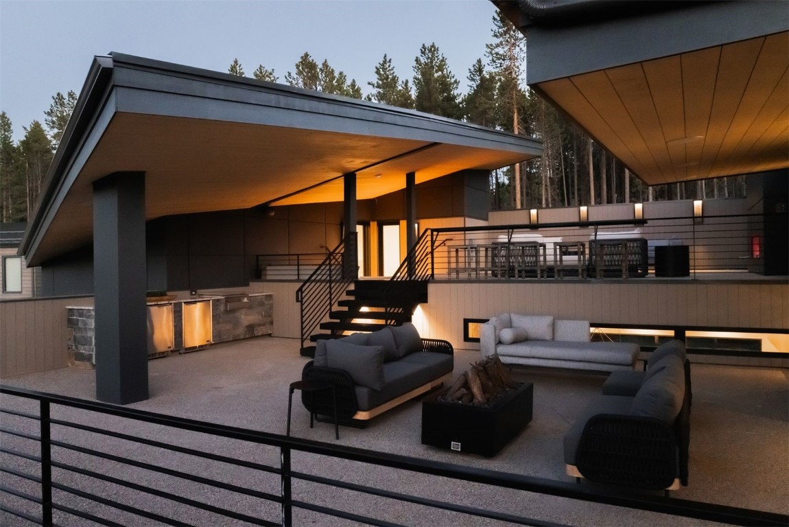 119 Boulder Circle Breckenridge, CO 80424 - Photo 41 of 50 a view of a balcony with chairs and wooden floor