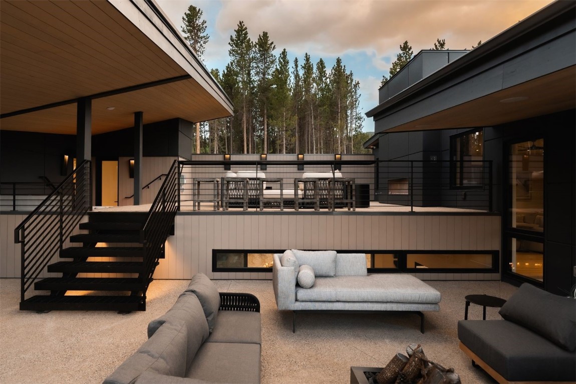 119 Boulder Circle Breckenridge, CO 80424 - Photo 43 of 50 a view of patio with couches table and chairs with wooden floor