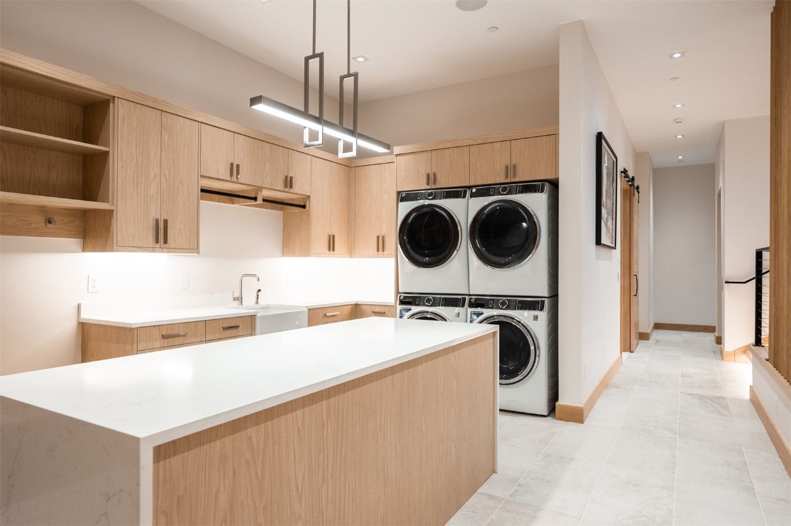 119 Boulder Circle Breckenridge, CO 80424 - Photo 46 of 50 a utility room with sink dryer and washer
