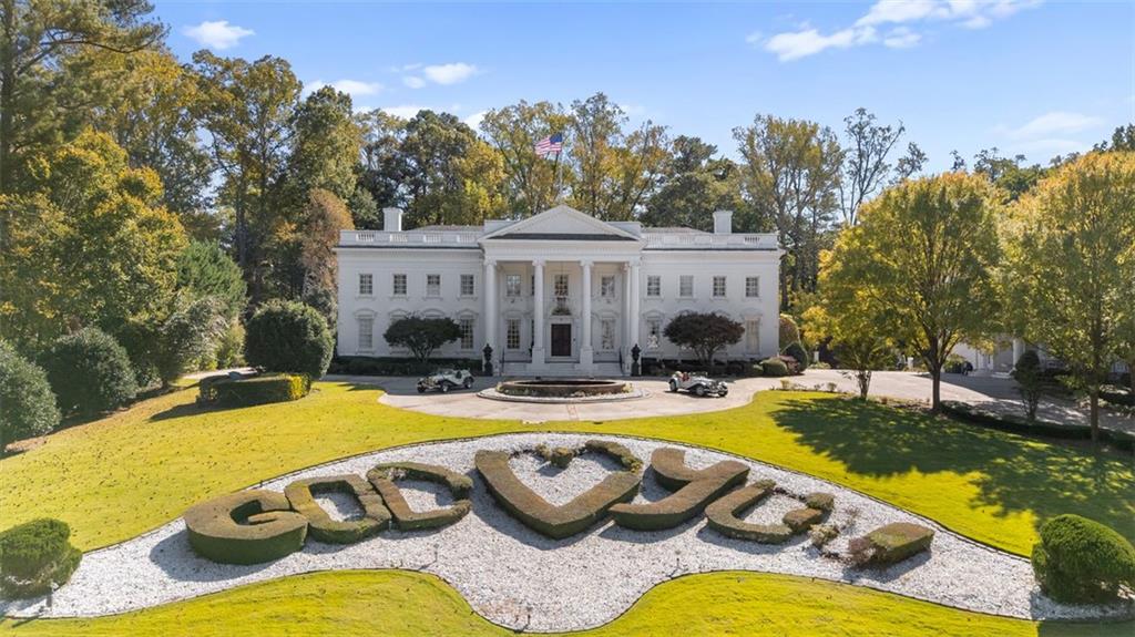 3687 Briarcliff Road Northeast Atlanta, GA 30345 - Photo 104 of 131 a view of a swimming pool with a lounge chairs