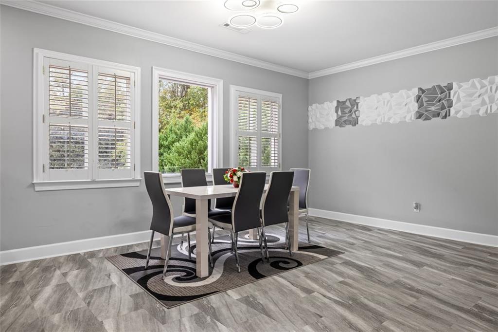 3687 Briarcliff Road Northeast Atlanta, GA 30345 - Photo 126 of 131 a view of a dining room with furniture window and outside view