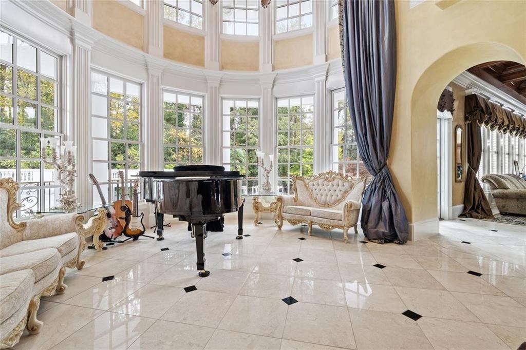 3687 Briarcliff Road Northeast Atlanta, GA 30345 - Photo 18 of 131 a view of living room with furniture and floor to ceiling windows
