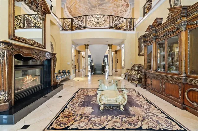a view of a livingroom with furniture window and outdoor view