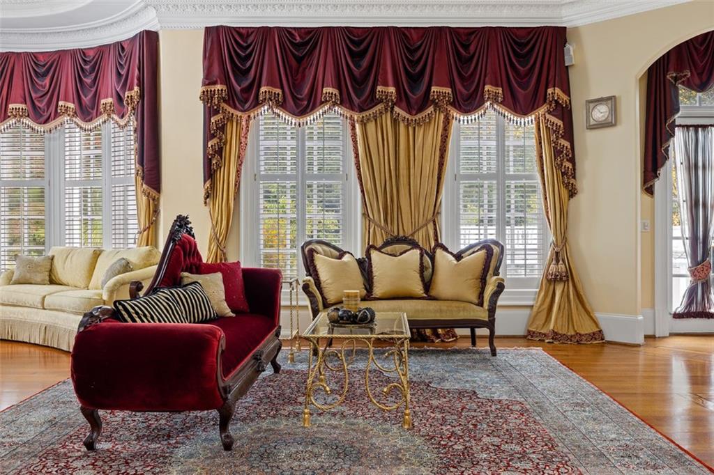 3687 Briarcliff Road Northeast Atlanta, GA 30345 - Photo 59 of 131 a living room with furniture and a wooden floor