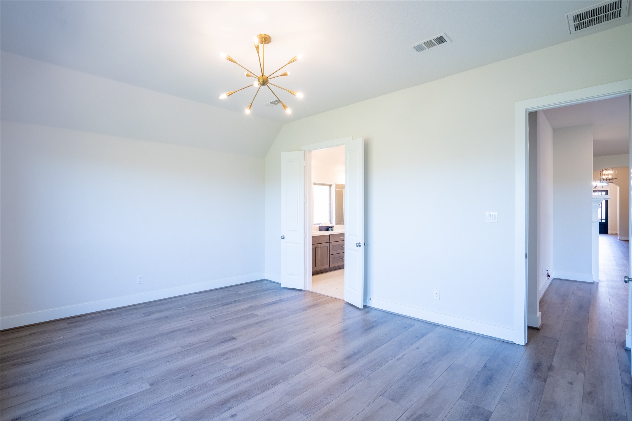 1309 Spring Gulch Lane Georgetown, TX 78628 - Photo 20 of 27 an empty room with wooden floor and ceiling fan