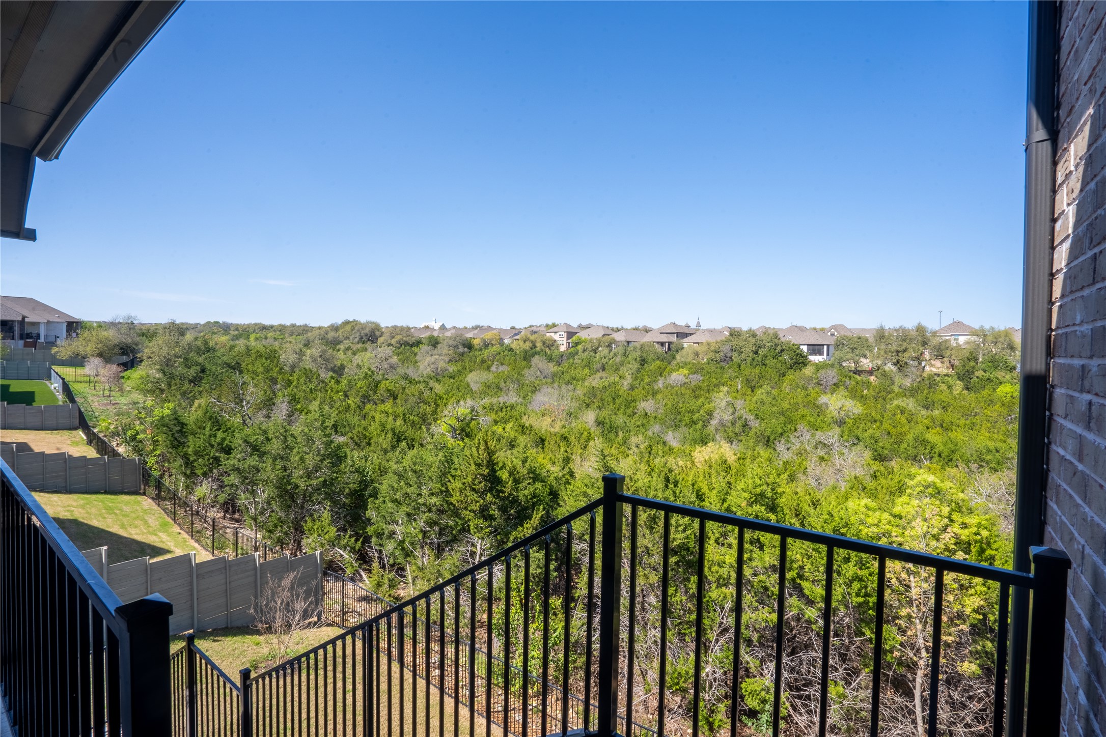 1309 Spring Gulch Lane Georgetown, TX 78628 - Photo 4 of 27 a view of a balcony with an outdoor space