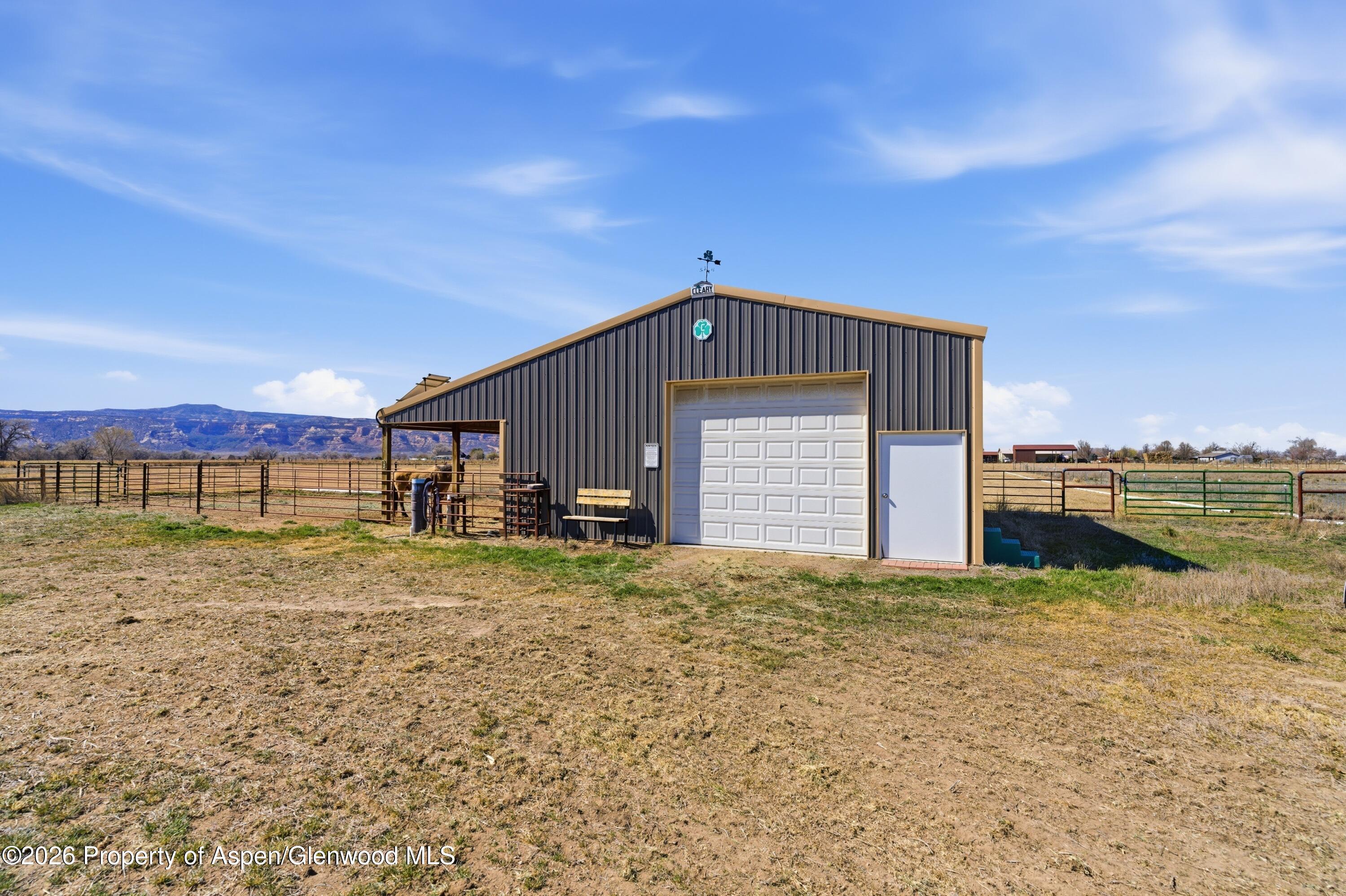 1081 20 Road Fruita, CO 81521 - Photo 19 of 43 a view of a house with a yard