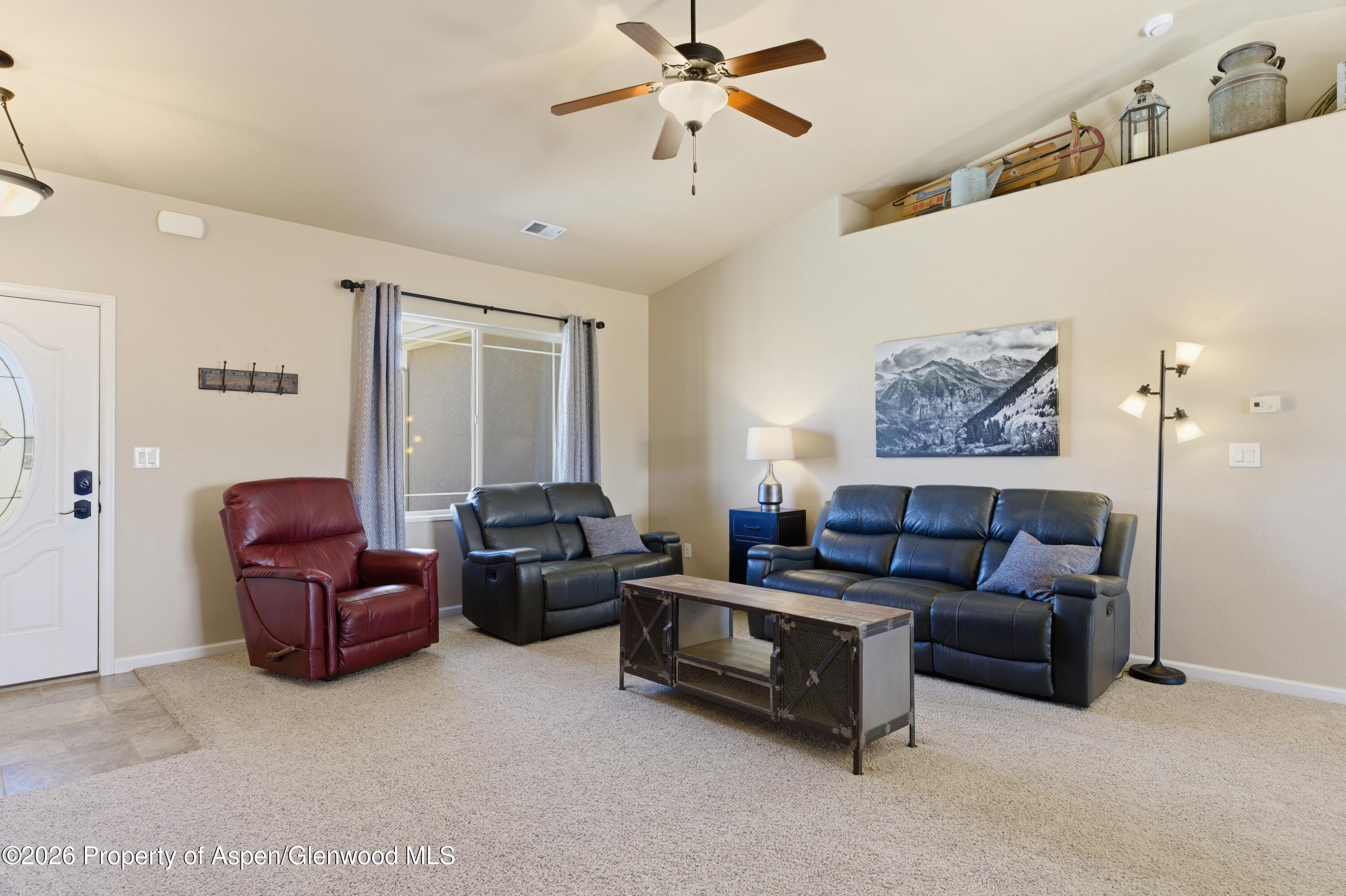 1081 20 Road Fruita, CO 81521 - Photo 3 of 43 a living room with furniture and a window