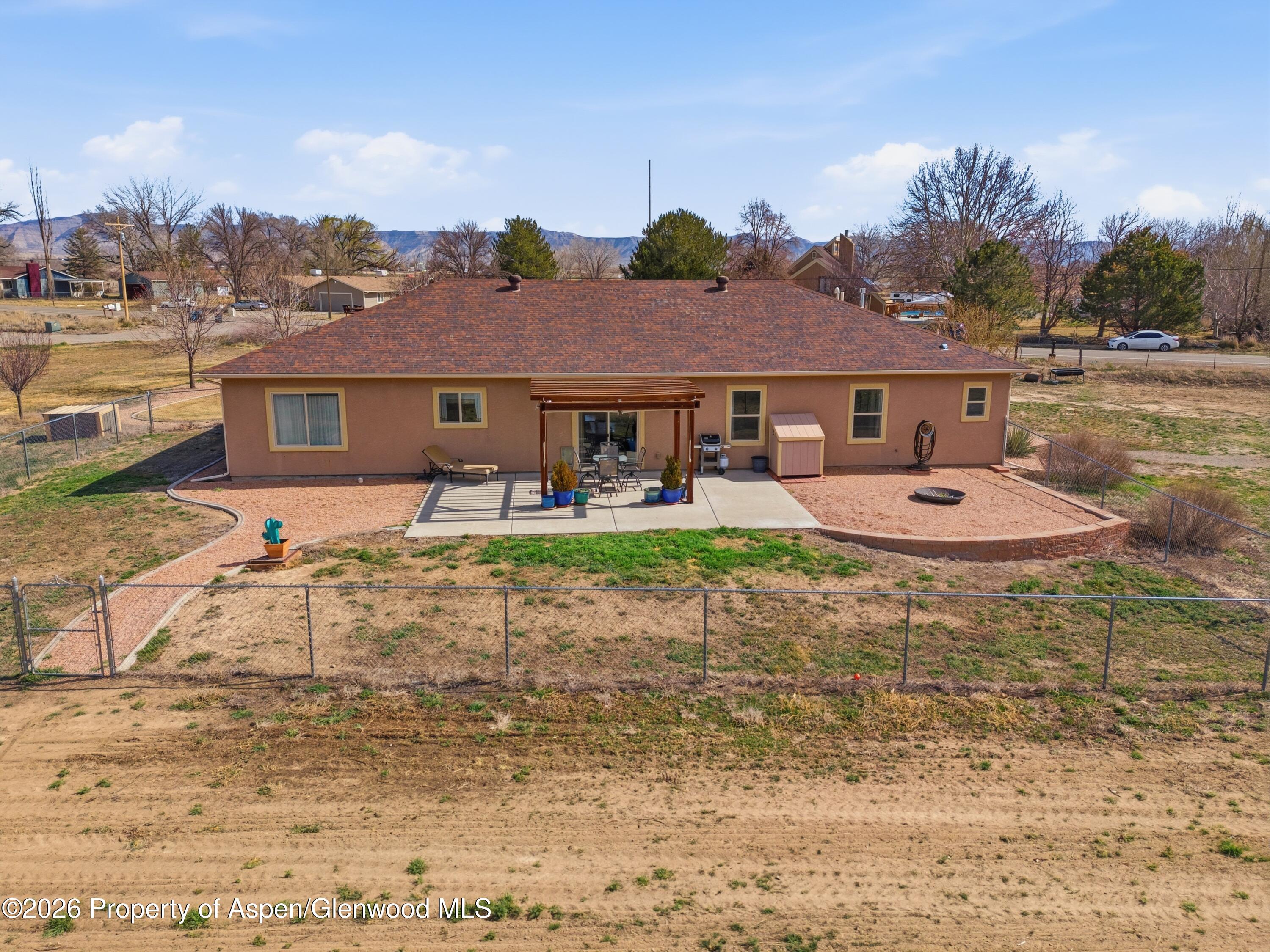 1081 20 Road Fruita, CO 81521 - Photo 37 of 43 a front view of a house with garden