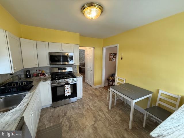 5501 River Road Pennsauken, NJ 08110 - Photo 15 of 58 new stove, microwave, dishwasher and