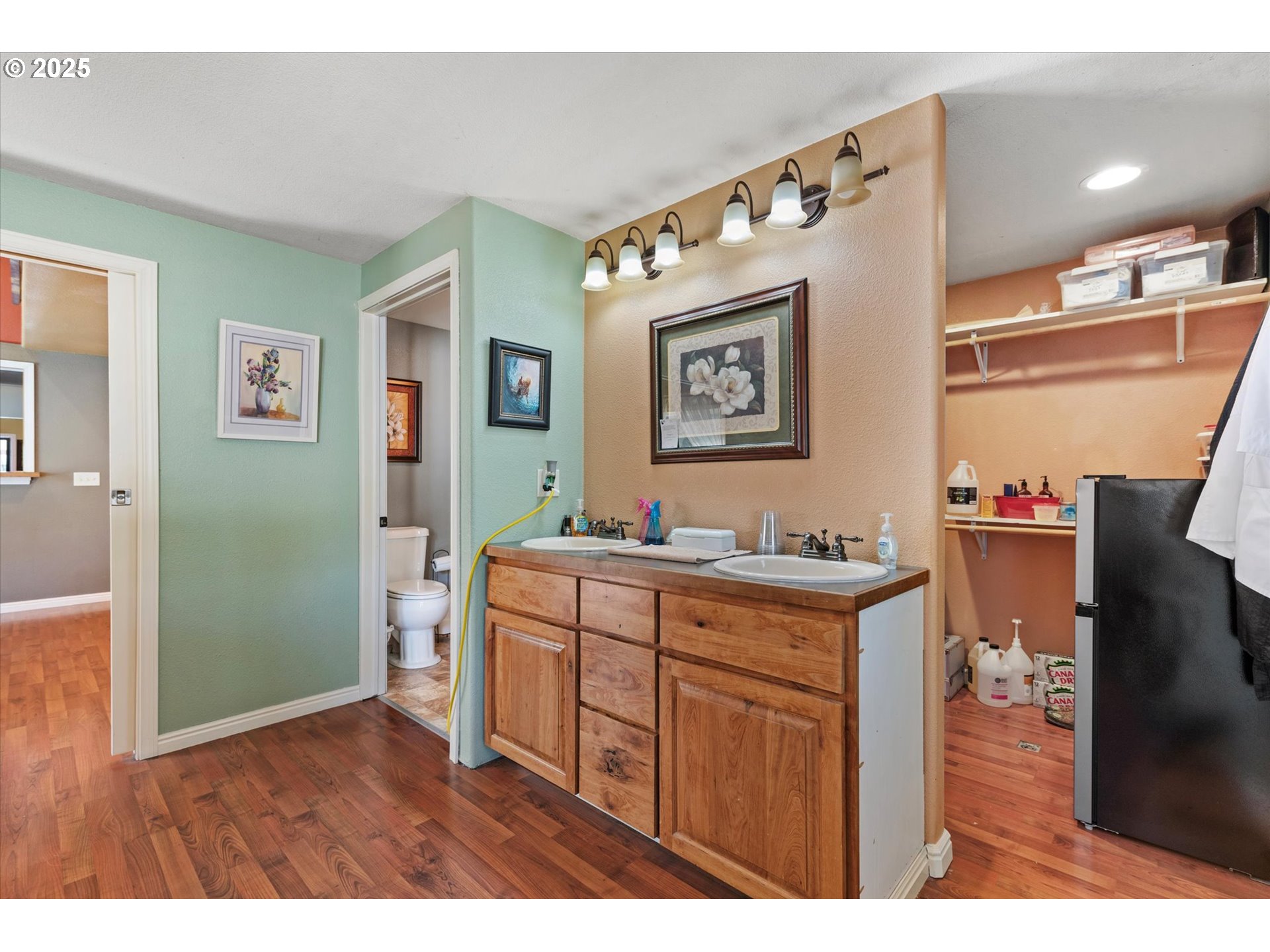2420 9th Street Baker City, OR 97814 - Photo 31 of 47 a kitchen with stainless steel appliances granite countertop a refrigerator and a stove