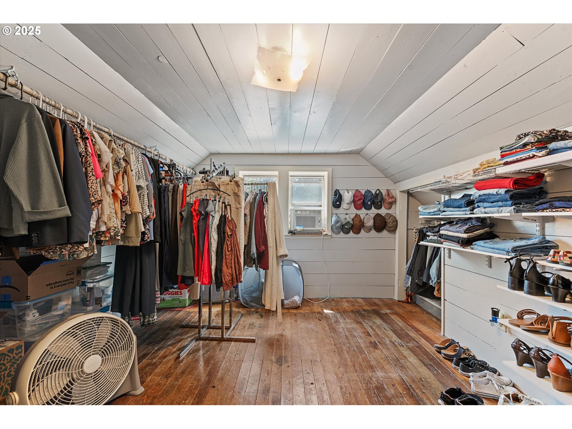 2420 9th Street Baker City, OR 97814 - Photo 39 of 47 a view of walk in closet with clothes