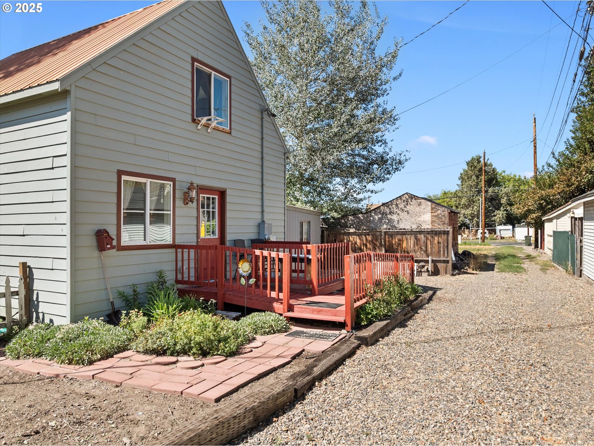 2420 9th Street Baker City, OR 97814 - Photo 7 of 47 a view of a house with a yard
