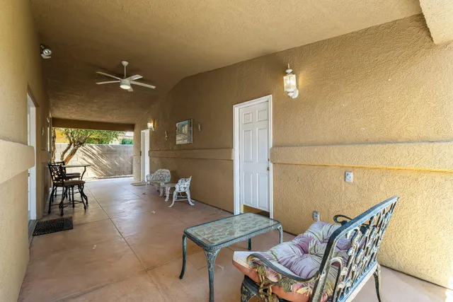 a living room with a couch and a flat screen tv
