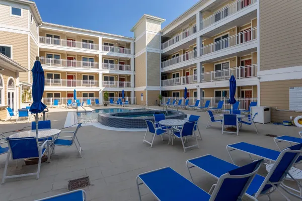 a building outdoor space with patio furniture
