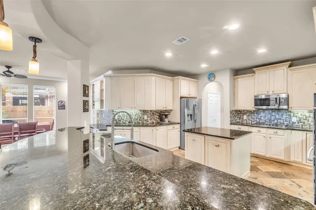 a view of a livingroom with furniture window and wooden floor
