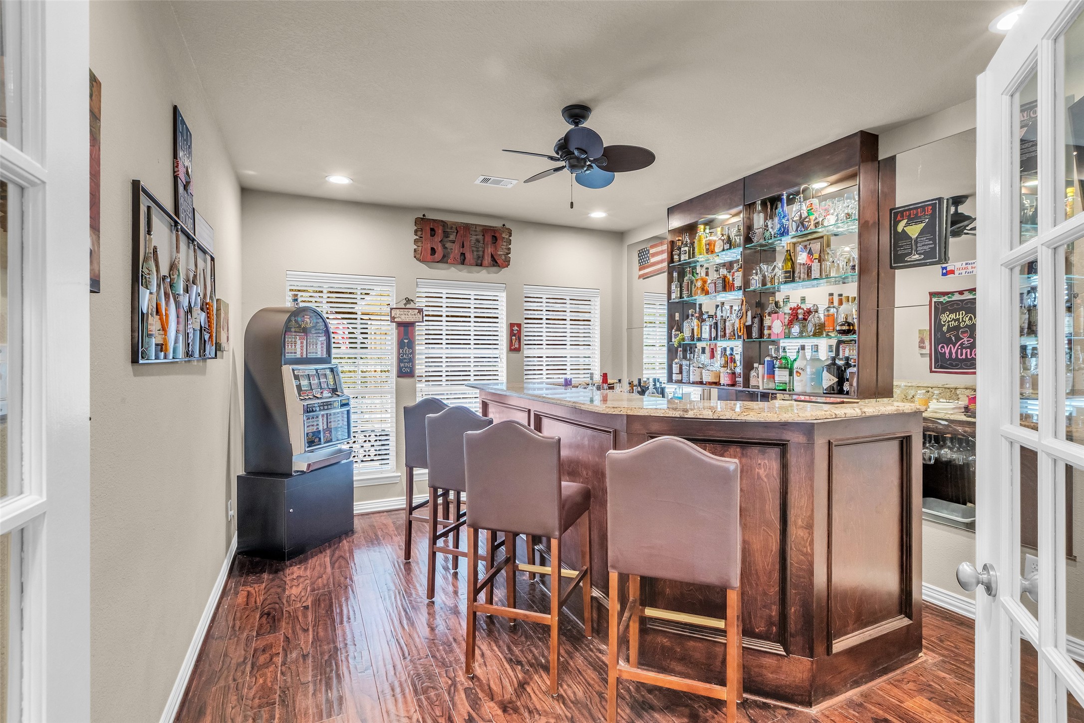 1622 Beau Rivage Conroe, TX 77304 - Photo 17 of 37 a view of a dining room with furniture window and wooden floor