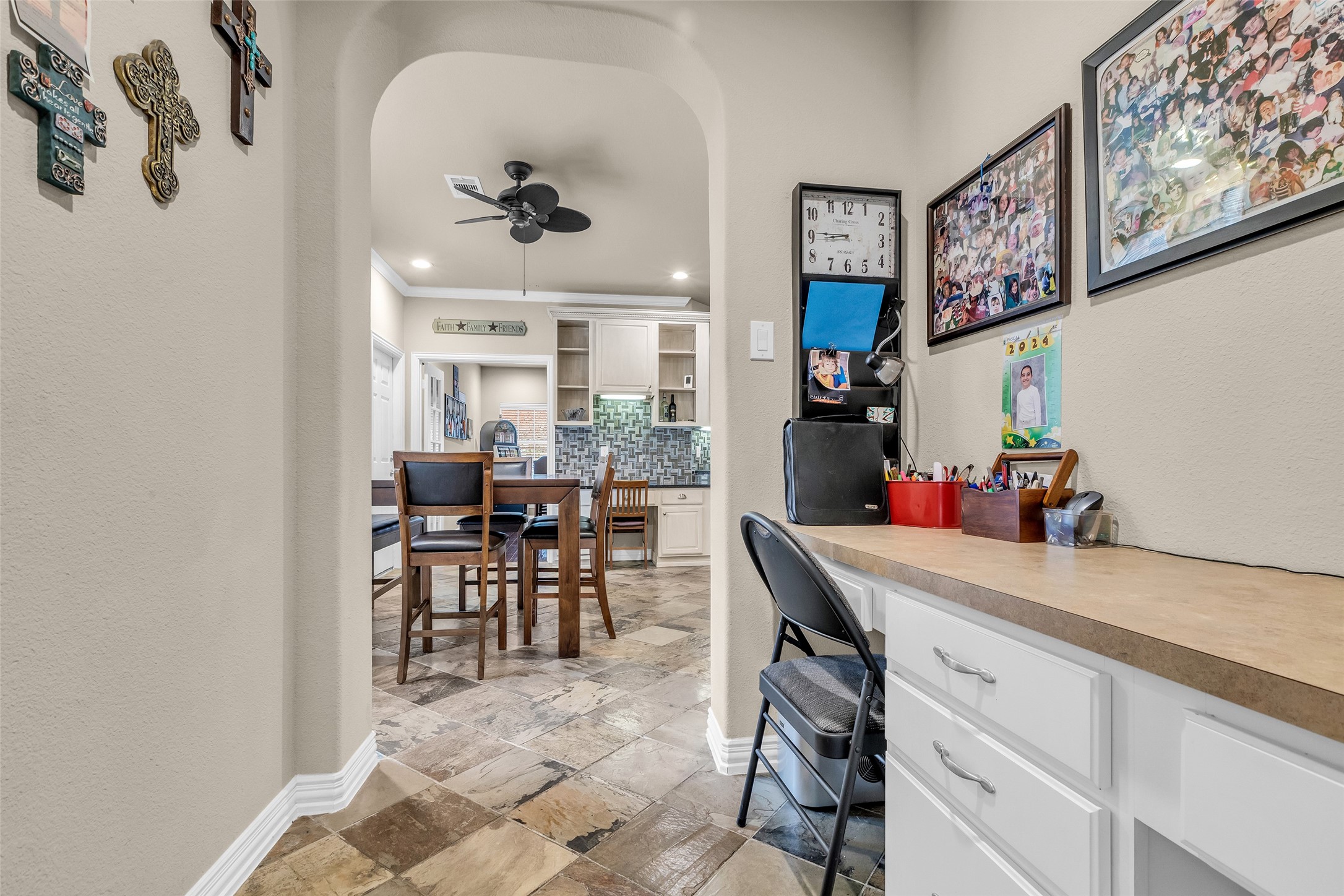 1622 Beau Rivage Conroe, TX 77304 - Photo 18 of 37 a view of a dining room with furniture and chandelier