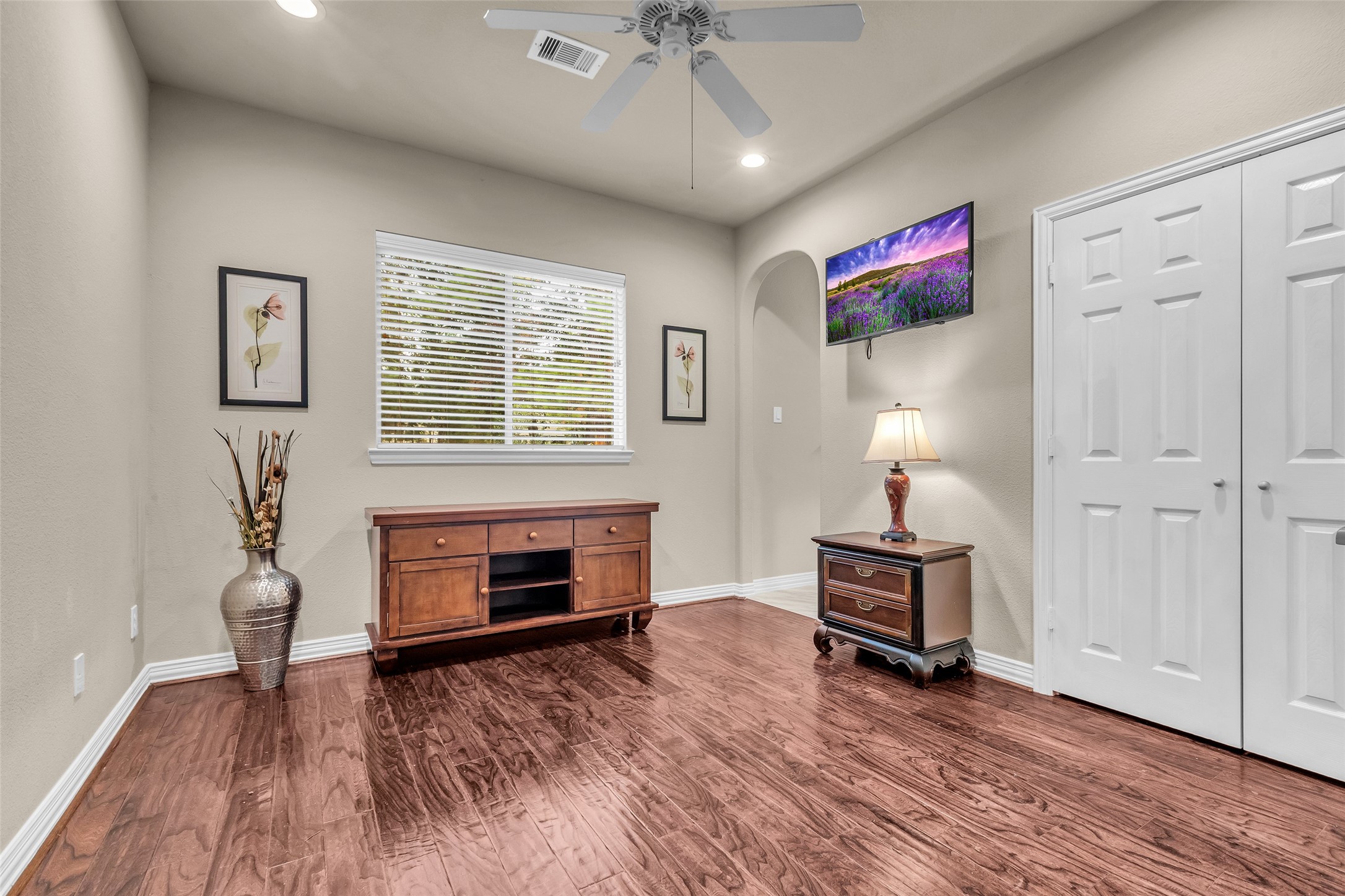 1622 Beau Rivage Conroe, TX 77304 - Photo 21 of 37 a living room with furniture and a fireplace
