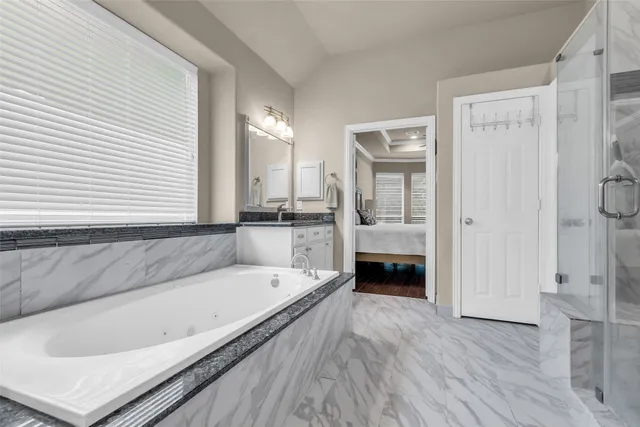 a living room with stainless steel appliances kitchen island granite countertop furniture and a kitchen view