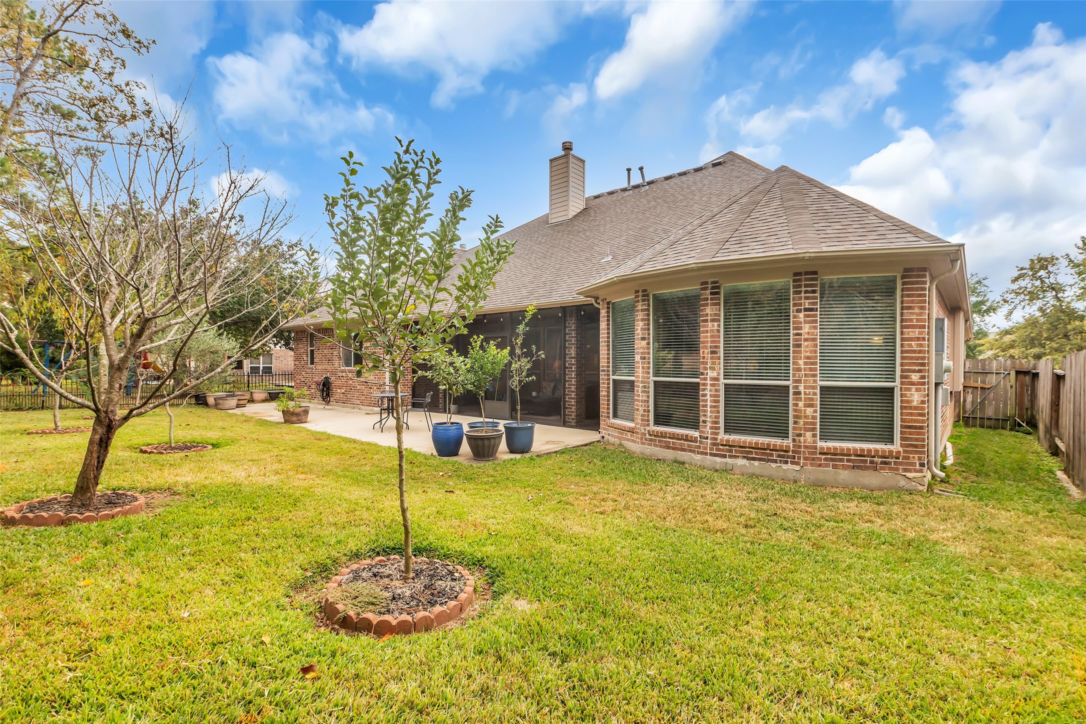 1622 Beau Rivage Conroe, TX 77304 - Photo 28 of 37 a house with swimming pool in front of it