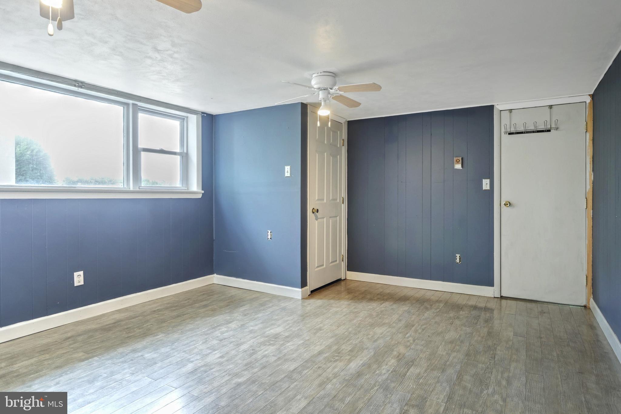 147 Mud College Road Littlestown, PA 17340 - Photo 24 of 43 a view of an empty room with window and closet area