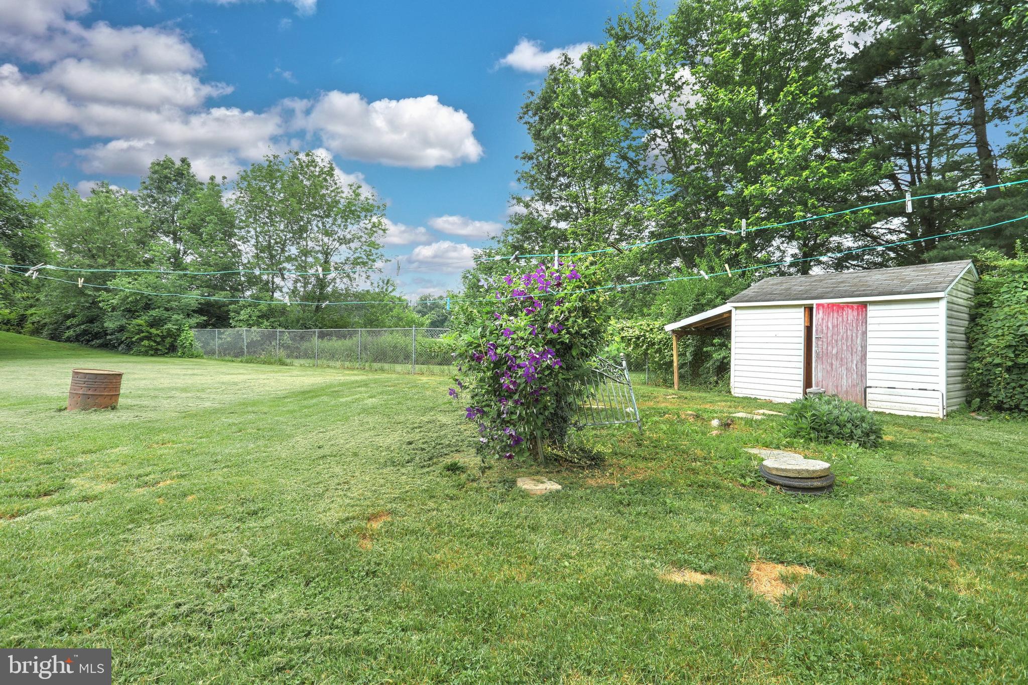 147 Mud College Road Littlestown, PA 17340 - Photo 31 of 43 a backyard of a house with lots of green space