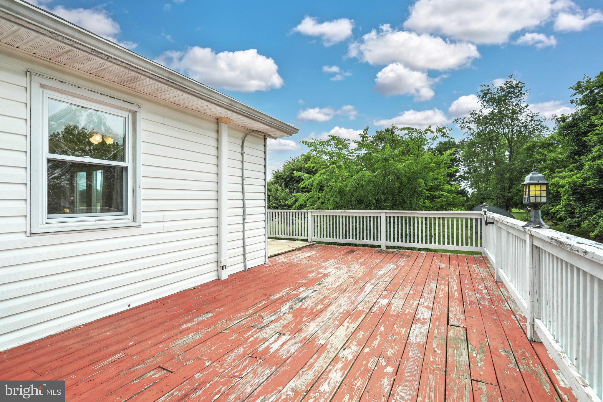 147 Mud College Road Littlestown, PA 17340 - Photo 35 of 43 a view of a balcony with wooden floor