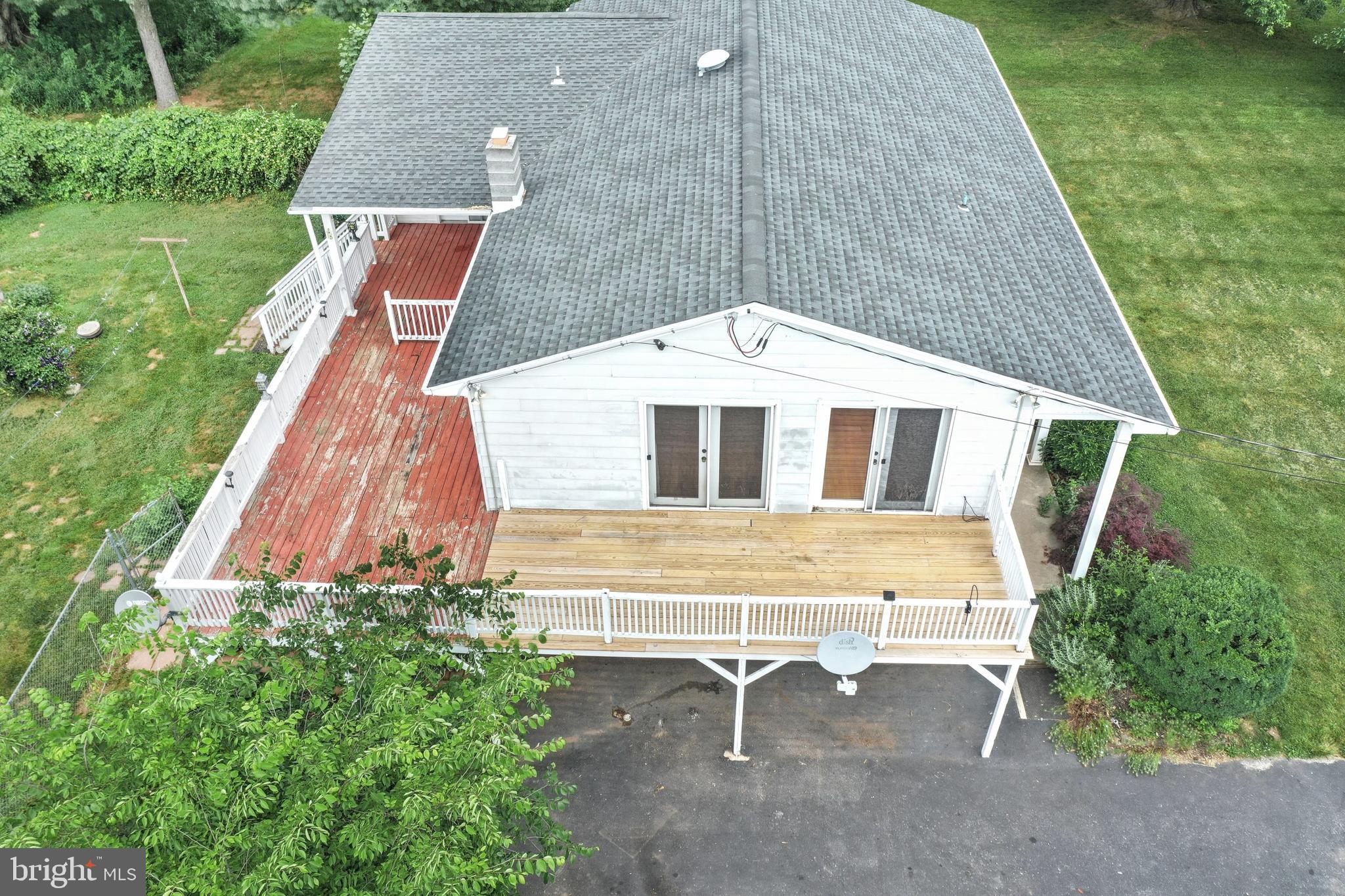 147 Mud College Road Littlestown, PA 17340 - Photo 36 of 43 a backyard of a house with table and chairs
