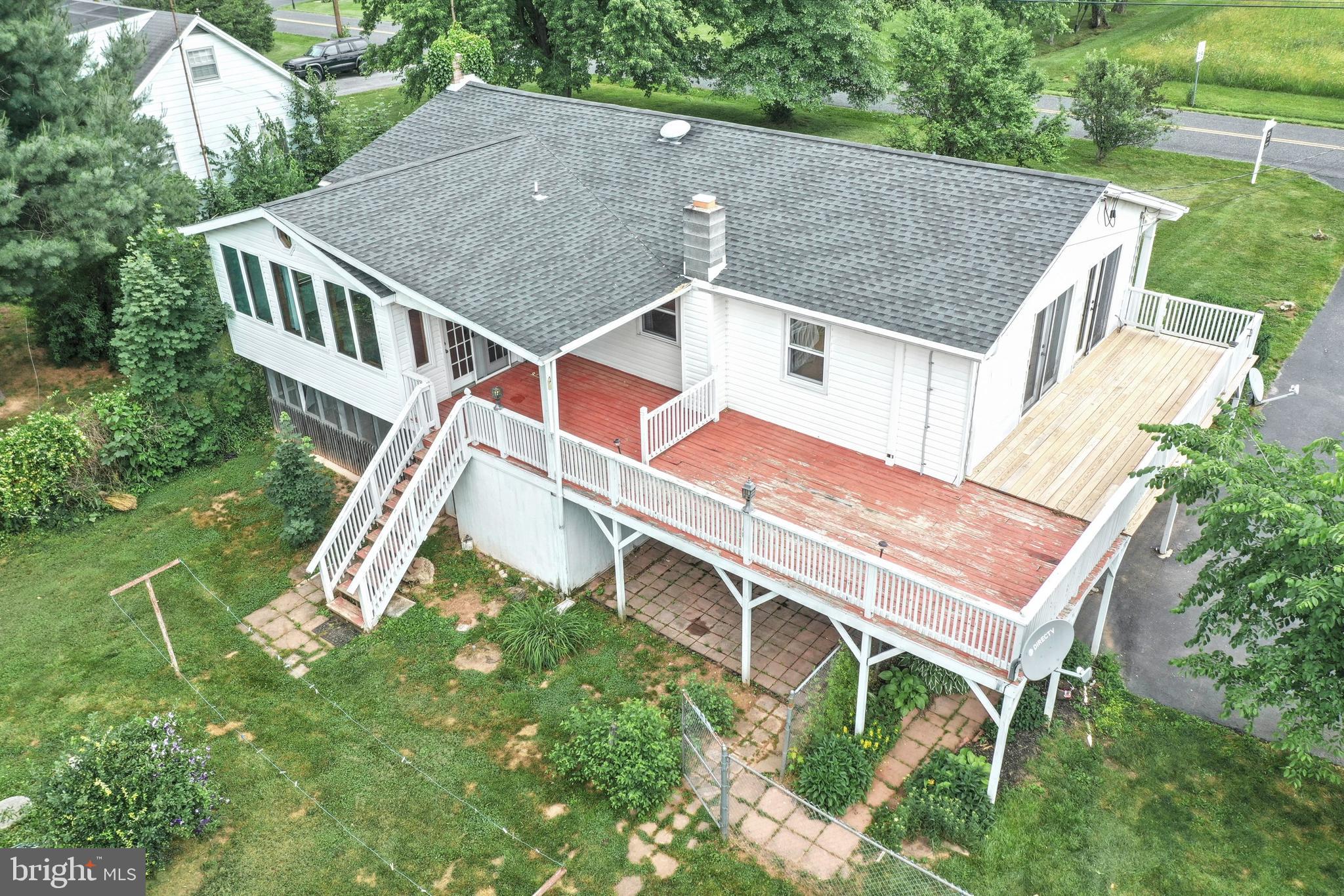 147 Mud College Road Littlestown, PA 17340 - Photo 38 of 43 an aerial view of a house with a yard