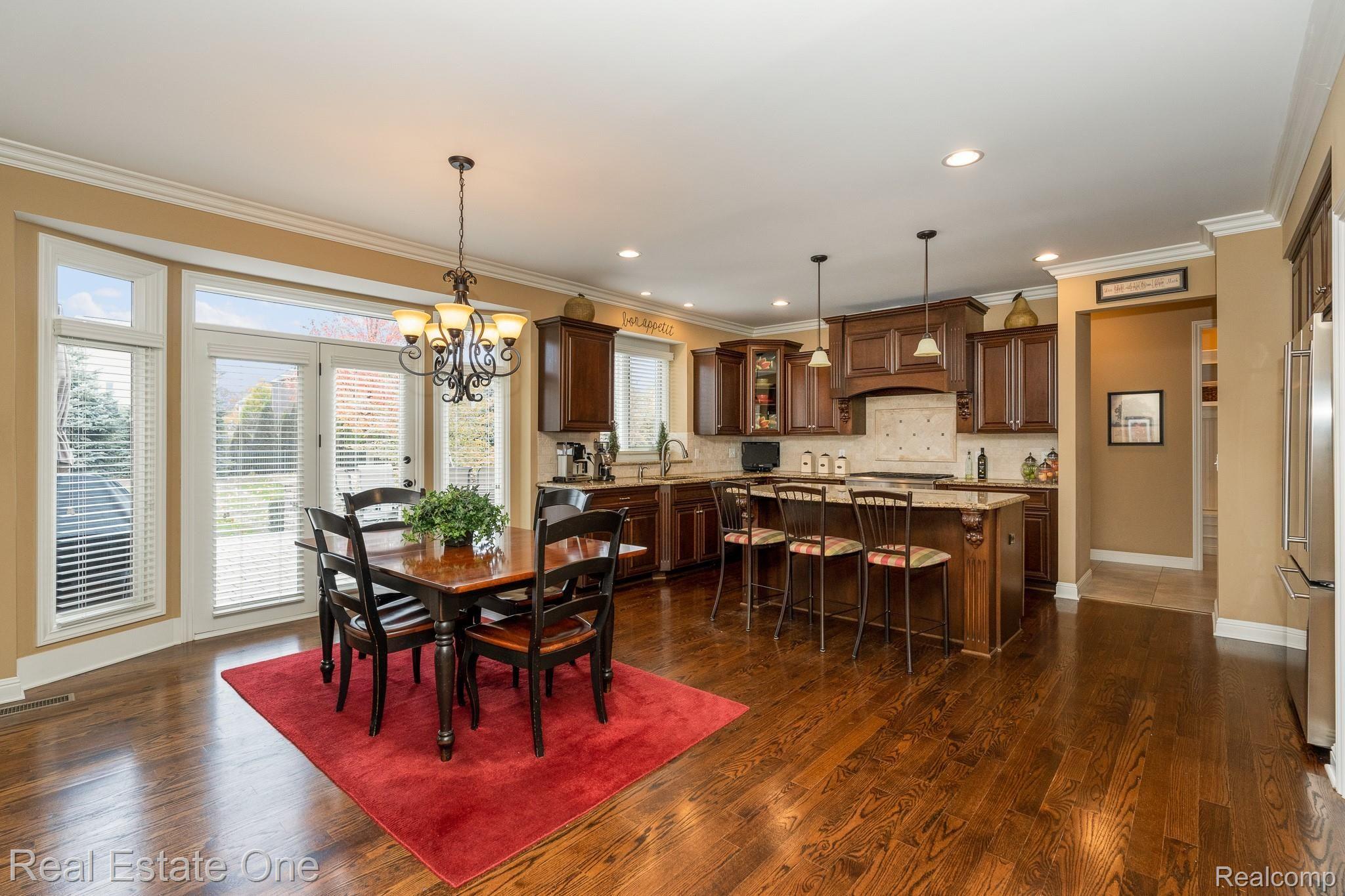 1577 Serene Court Rochester, MI 48306 - Photo 16 of 38 Kitchen with eat-in and door to patio