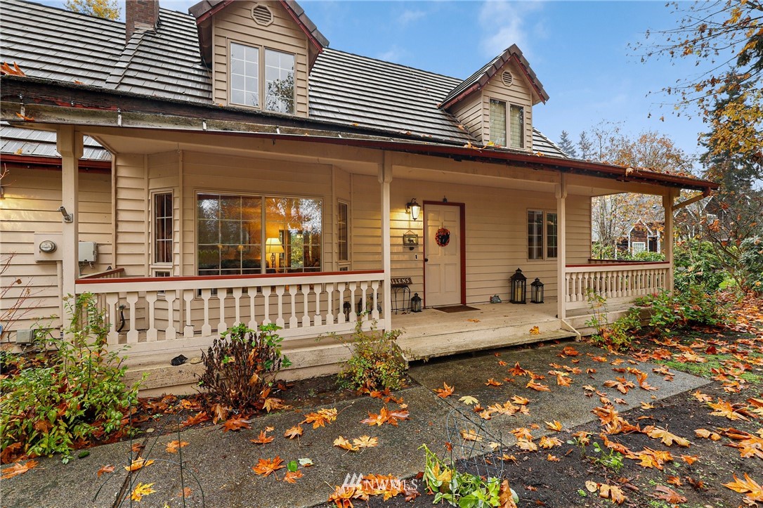 4313 212th Street Southeast Bothell, WA 98021 - Photo 3 of 40 a front view of a house with a porch