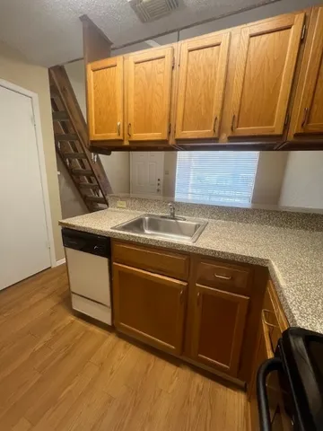 a bathroom with a sink and a large mirror