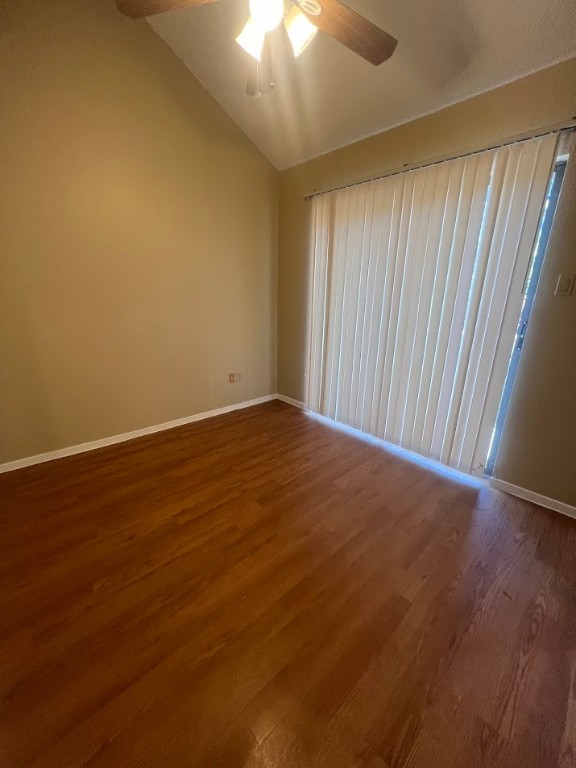 2210 Pearl Street, Unit 302 Austin, TX 78705 - Photo 14 of 18 an empty room with wooden floor and windows