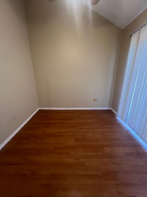 2210 Pearl Street, Unit 302 Austin, TX 78705 - Photo 15 of 18 an empty room with wooden floor and windows