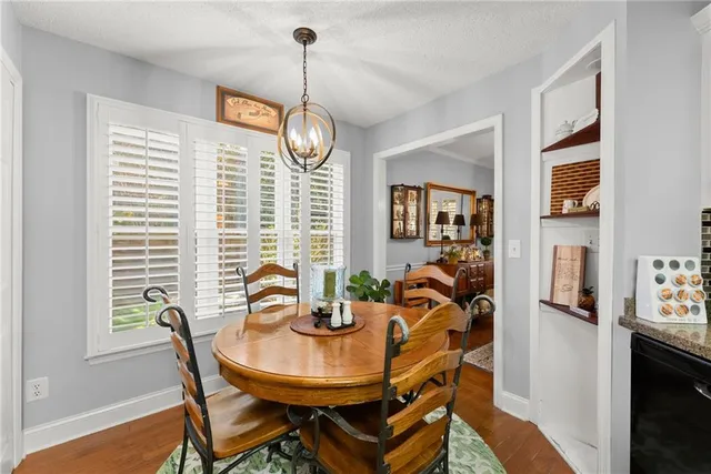 a room with furniture and ceiling fan