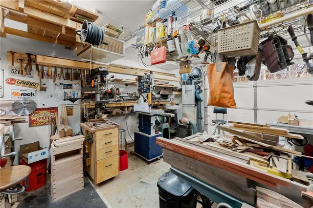 a view of a house with a flower garden