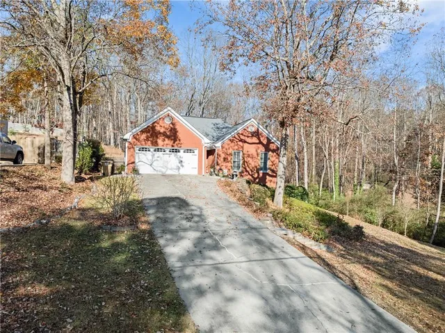 a living room with furniture fireplace and window