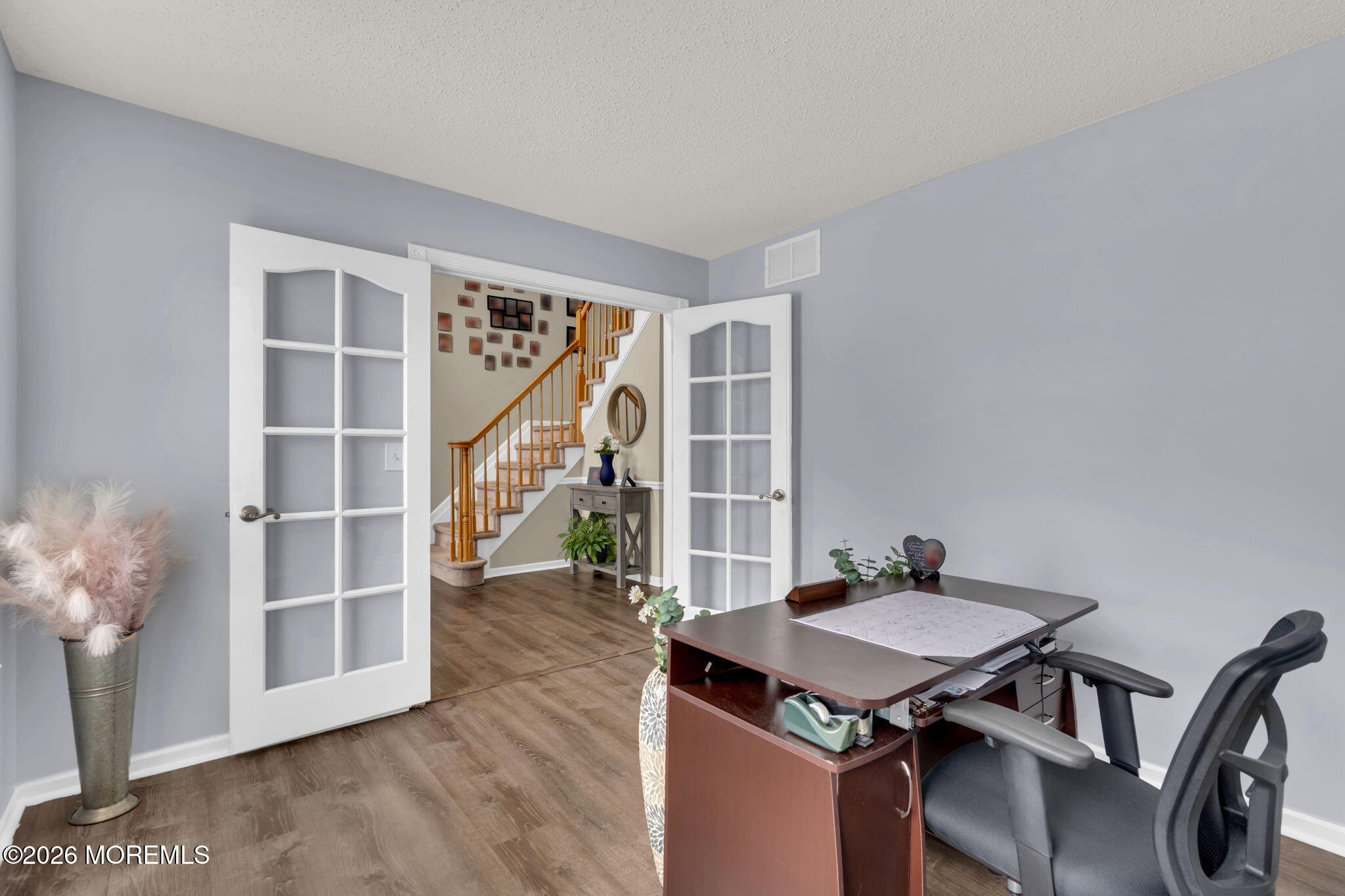 93 West Shenendoah Road Howell, NJ 07731 - Photo 18 of 30 a view of a dining room with furniture and wooden floor