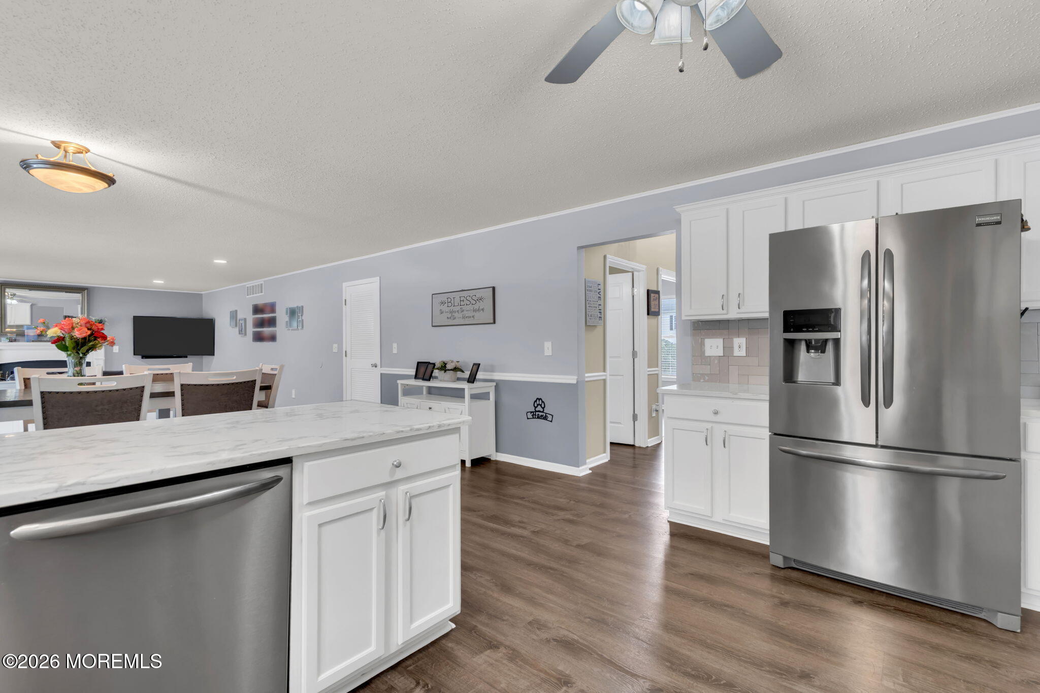 93 West Shenendoah Road Howell, NJ 07731 - Photo 2 of 30 a kitchen with a sink stainless steel appliances and cabinets