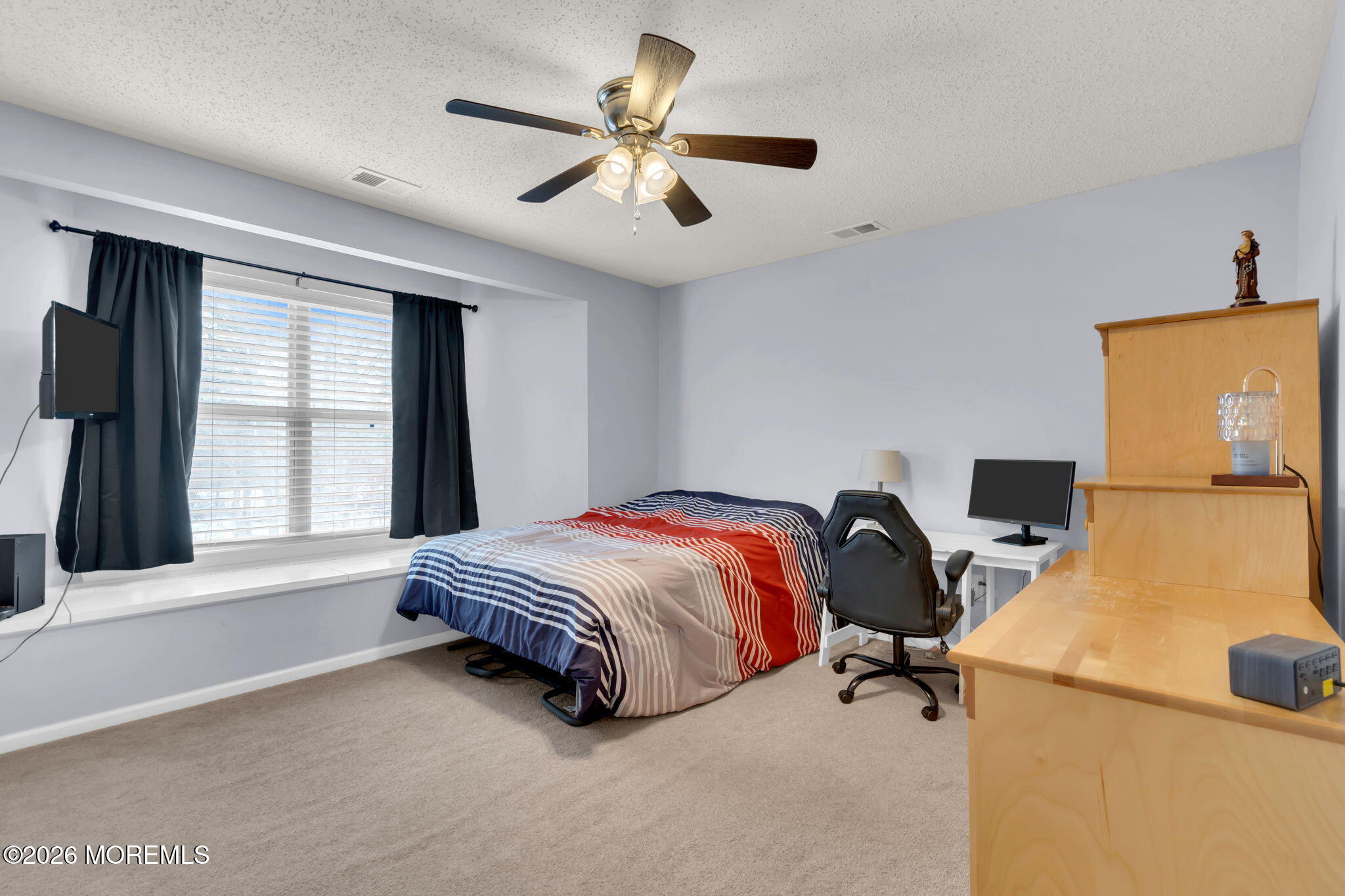 93 West Shenendoah Road Howell, NJ 07731 - Photo 25 of 30 a bedroom with a bed and a window