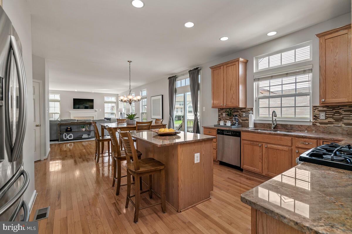 18414 Cornflower Road Boyds, MD 20841 - Photo 18 of 63 Table Space Kitchen with Center Island
