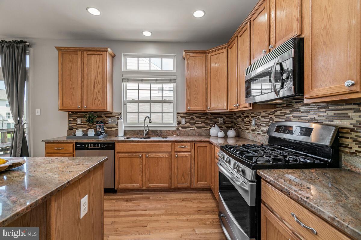 18414 Cornflower Road Boyds, MD 20841 - Photo 22 of 63 Table Space Kitchen with Center Island