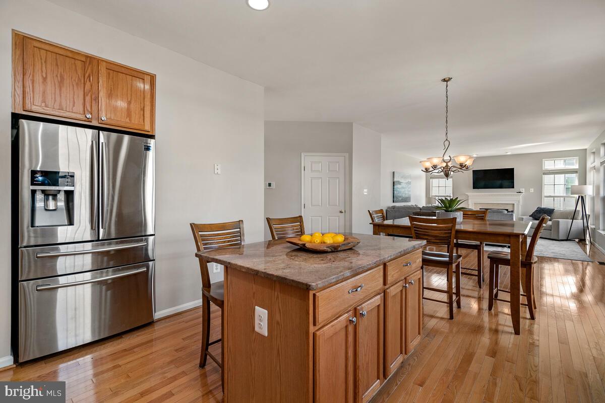 18414 Cornflower Road Boyds, MD 20841 - Photo 23 of 63 Table Space Kitchen with Center Island