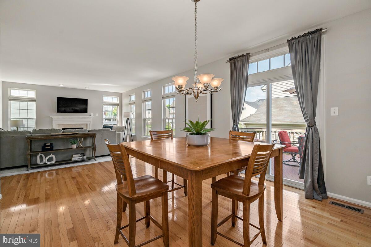 18414 Cornflower Road Boyds, MD 20841 - Photo 24 of 63 Table Space Kitchen with Deck Access