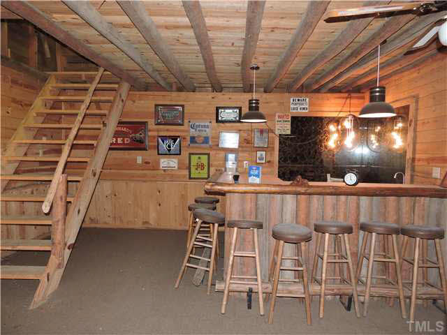 322 Raintree Road Timberlake, NC 27583 - Photo 23 of 25 a view of a chairs and table in a room