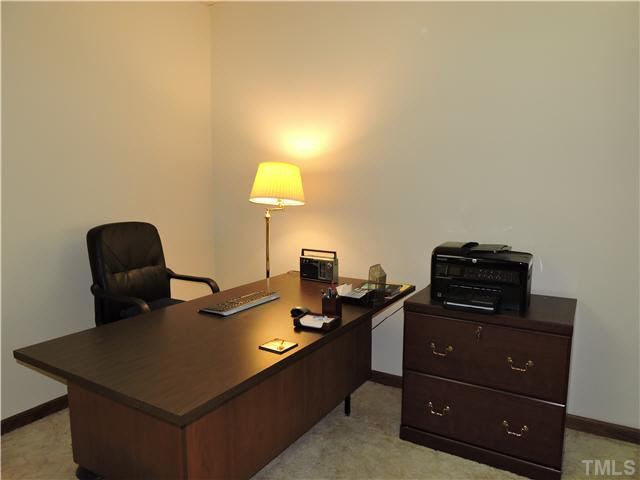 322 Raintree Road Timberlake, NC 27583 - Photo 9 of 25 a view of a workspace with furniture